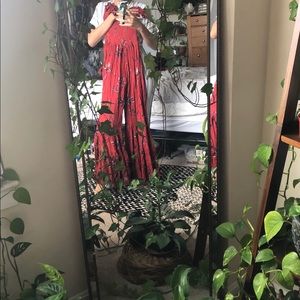 Red flowered jumpsuit with flared legs